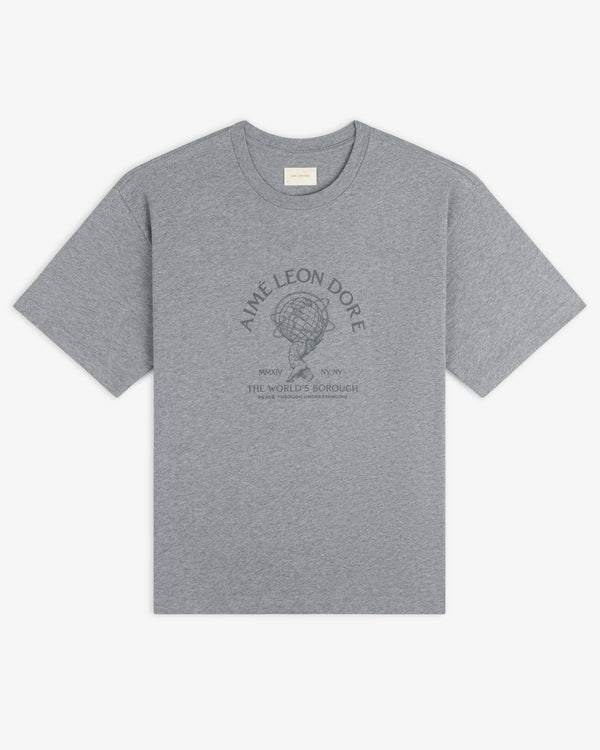 Atlas Melange Tee: grey short-sleeve t-shirt with a graphic of a hand holding a globe and printed text on the chest.