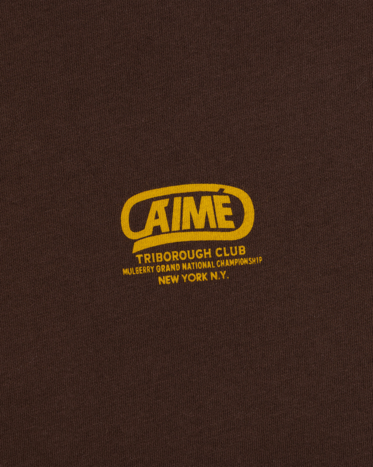 Brown Triborough Club Tee with a yellow logo reading AIME, Triborough Club, Mulberry Grand National Championship, New York.