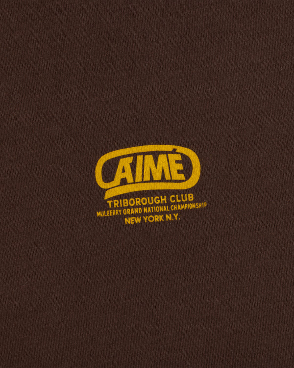 Brown Triborough Club Tee with a yellow logo reading AIME, Triborough Club, Mulberry Grand National Championship, New York.