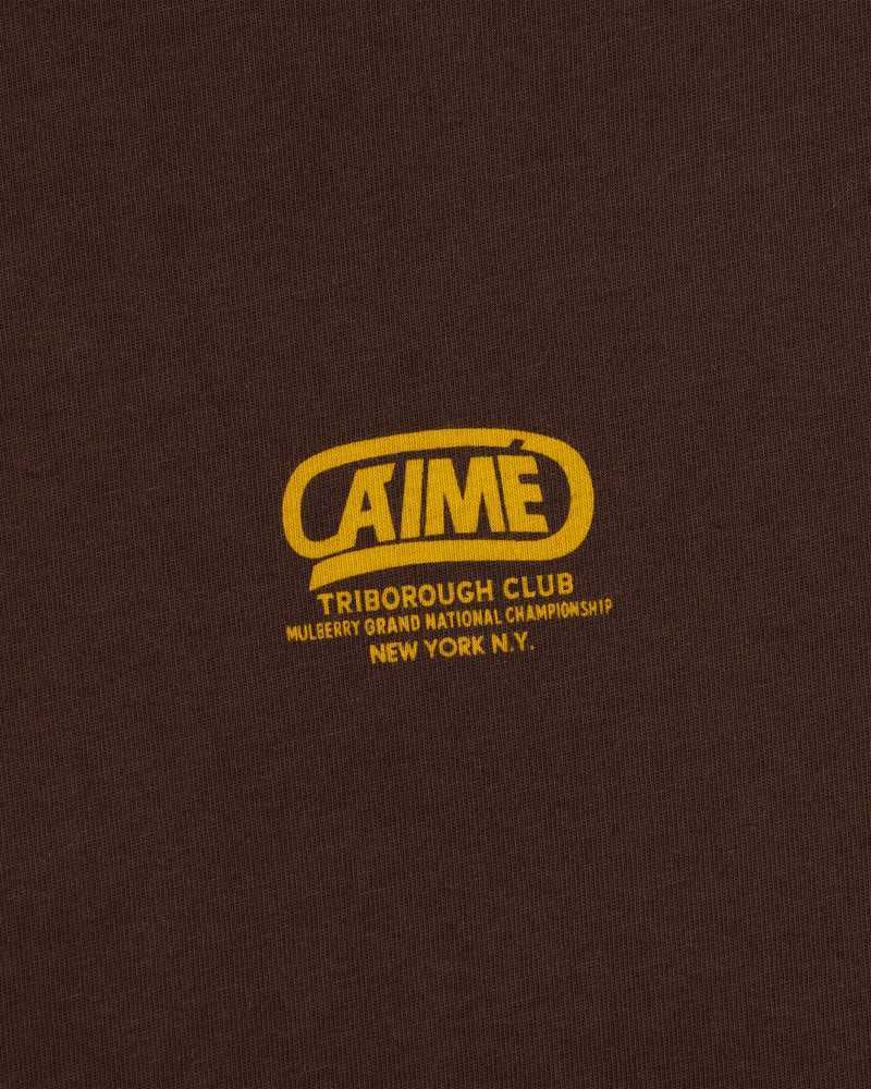 Brown Triborough Club Tee with a yellow logo reading AIME, Triborough Club, Mulberry Grand National Championship, New York.