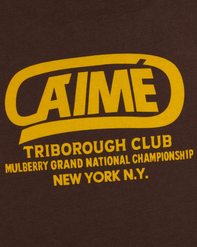 Brown Triborough Club Tee with yellow text reading Aime, Triborough Club, Mulberry Grand National Championship, and N.Y.