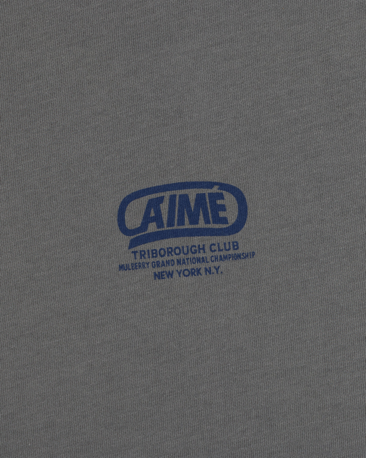 Gray Triborough Club Tee with a blue graphic logo reading Aime Triborough Club Mulberry Grand National Championship N.Y.