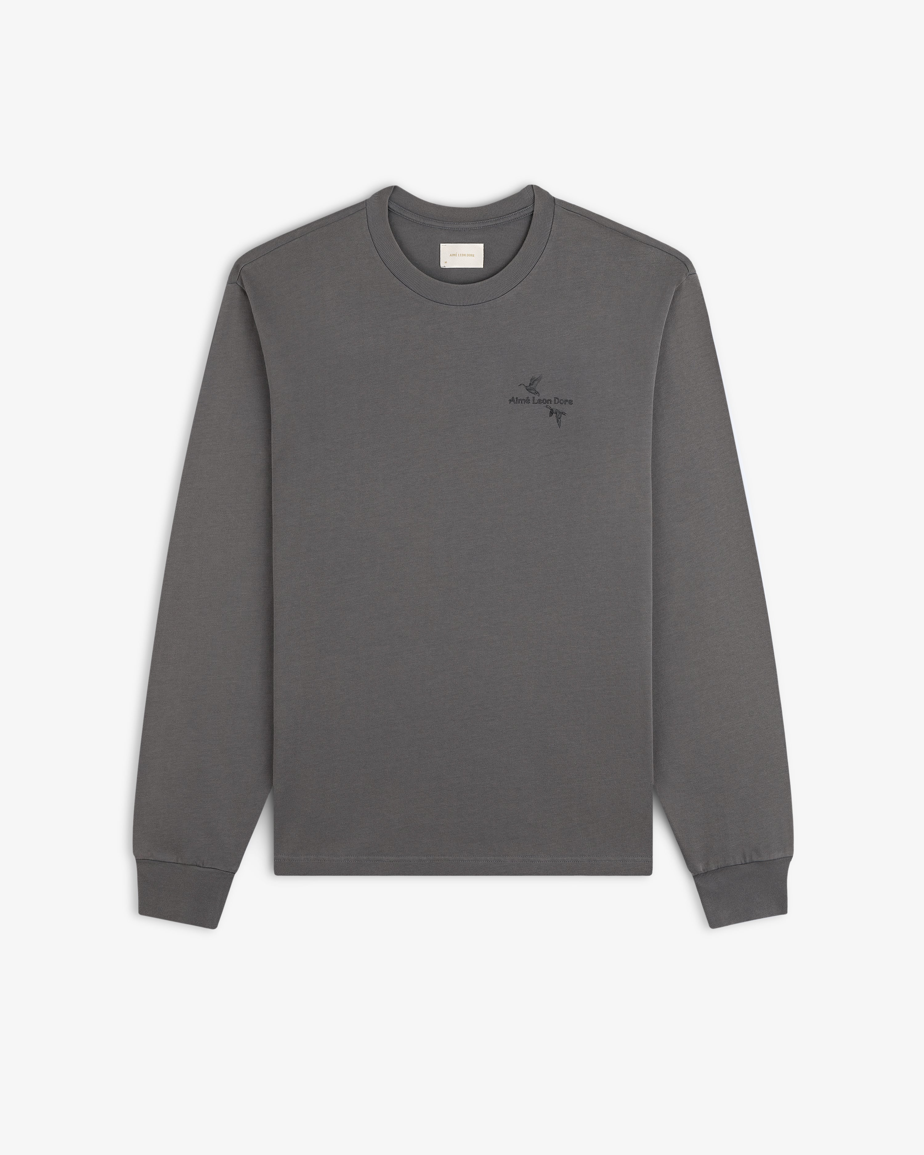 Charcoal grey long-sleeve Long-Sleeve Retriever Tee featuring two small bird illustrations and text on the left chest.