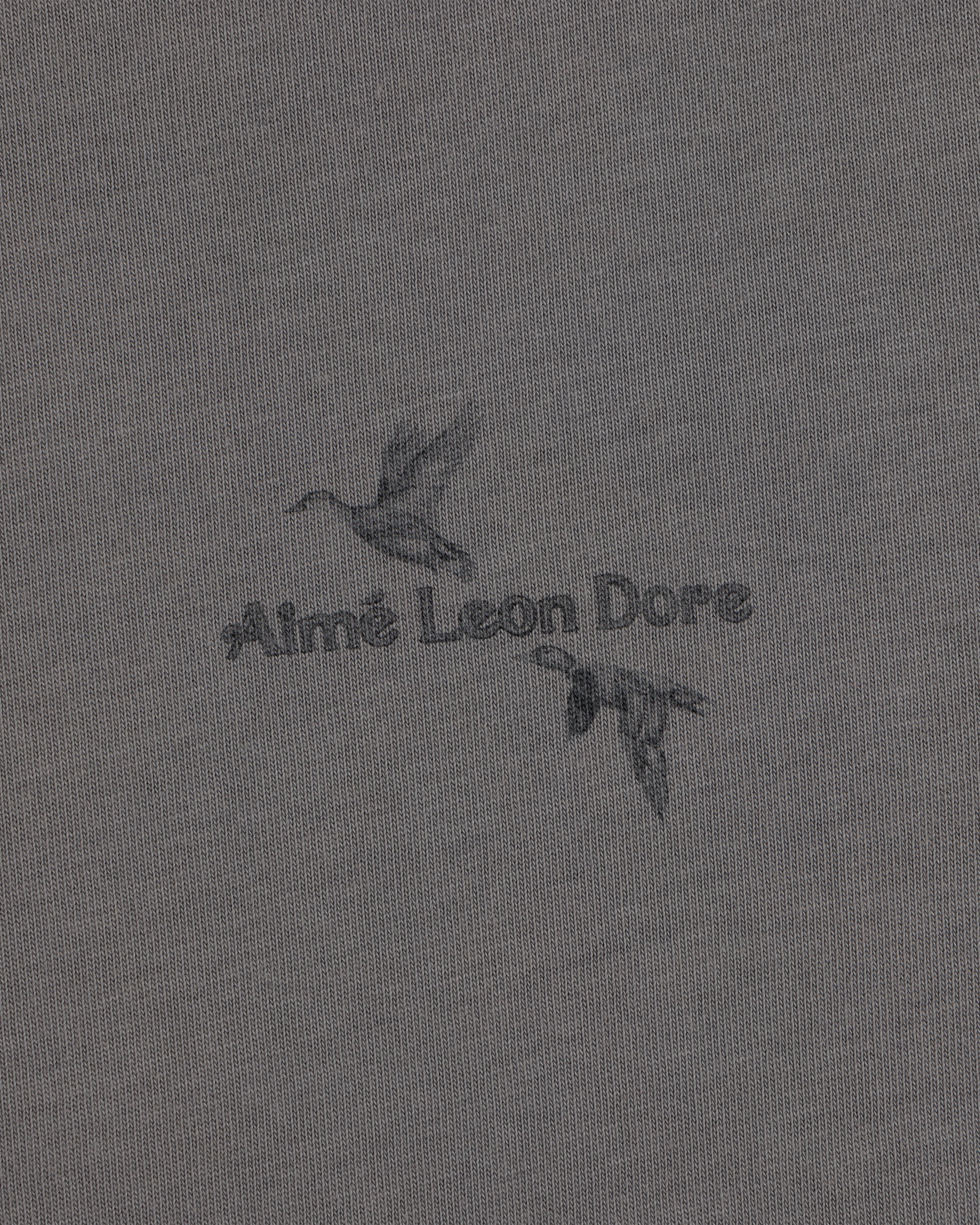 Long-Sleeve Retriever Tee in grey with a graphic of two flying ducks and the text Aimé Leon Dore.
