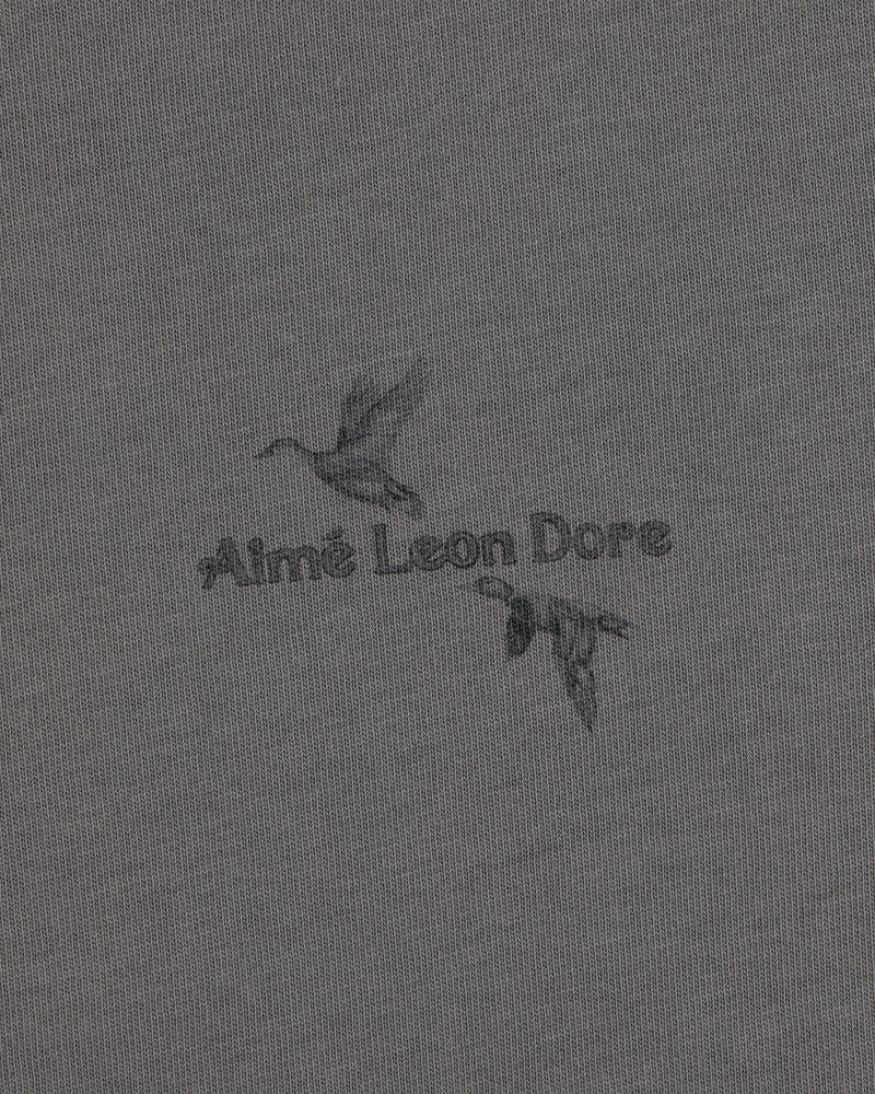 Long-Sleeve Retriever Tee in grey with a graphic of two flying ducks and the text Aimé Leon Dore.