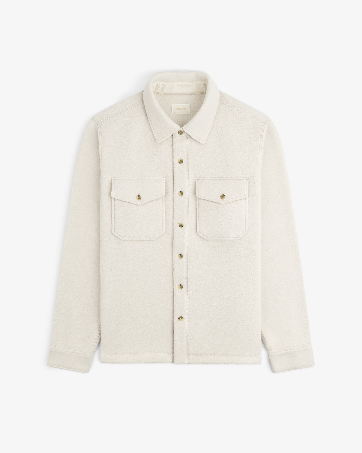 Melange Fleece Shirt in cream with two chest pockets and classic collar, laid flat on a white background.
