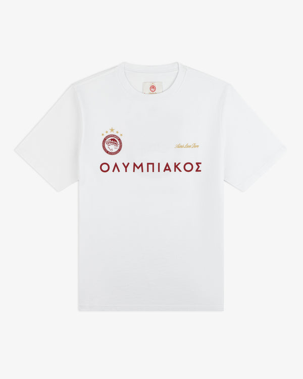 White ALD / Olympiacos F.C. Souvenir Tee with a soccer crest, cursive script, and Greek lettering across the chest.