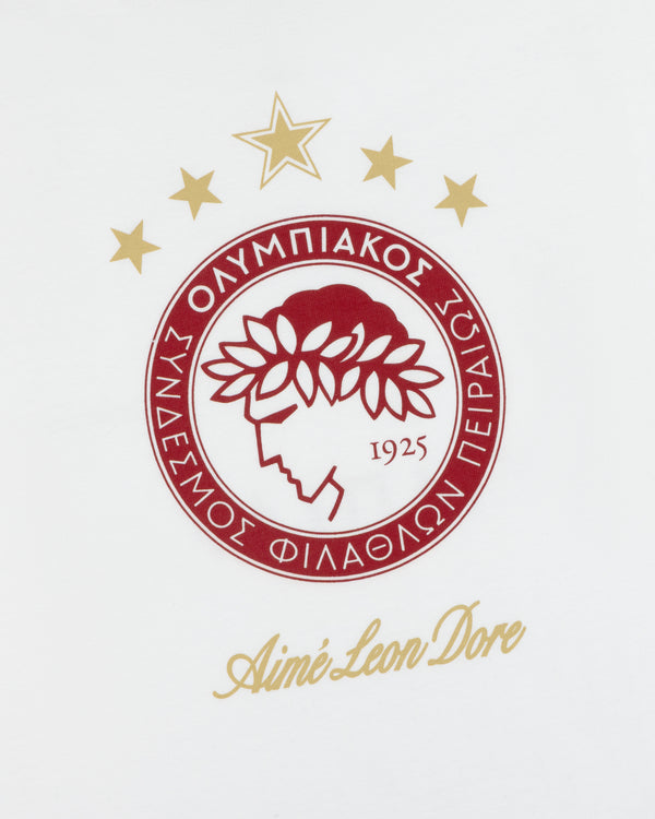 ALD / Olympiacos F.C. Souvenir Tee featuring the circular club logo with a laurel-wreathed profile, 1925, and five stars.