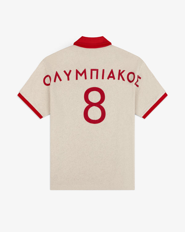 ALD / Olympiacos F.C. Heritage Ringer Polo: beige with red collar and trim, plus red ΟΛΥΜΠΙΑΚΟΣ and number 8 on the back.