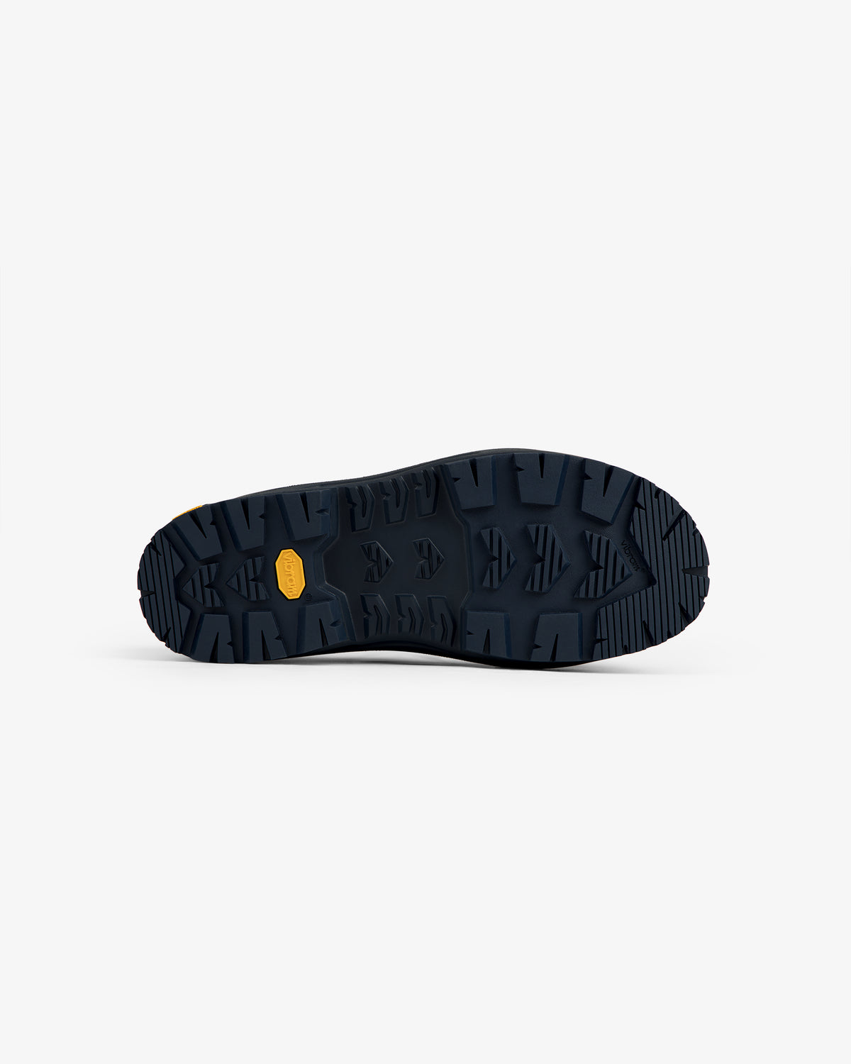 Dark blue sole of ALD / The North Face Base Camp Mule with deep treads and a small yellow label, viewed from below.