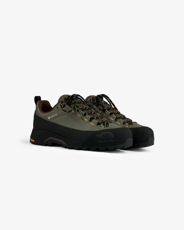 ALD/The North Face Verto Alpine GORE-TEX hiking shoes in green/black with patterned laces on a white background.