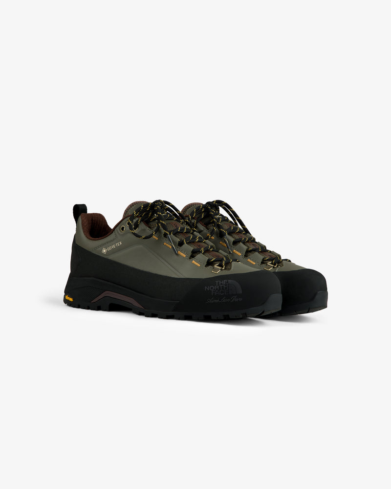 ALD/The North Face Verto Alpine GORE-TEX hiking shoes in green/black with patterned laces on a white background.