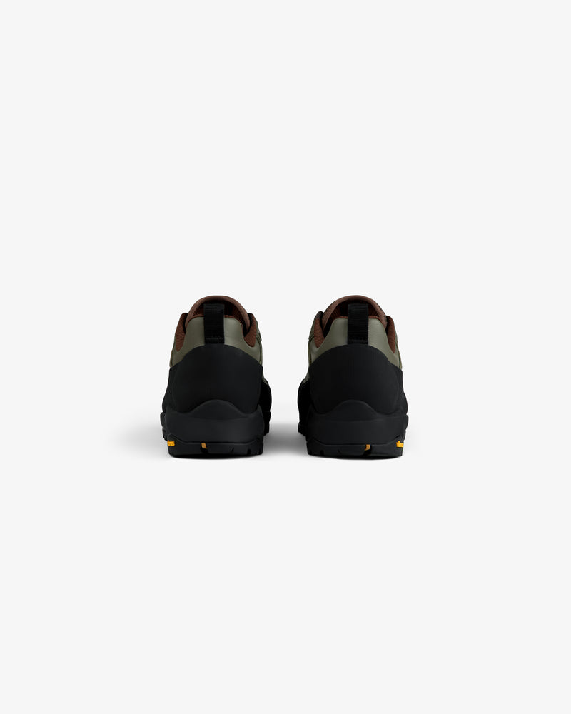 ALD/The North Face Verto Alpine GORE-TEX Hiking Shoes in green, brown & black seen from the back on a white background.