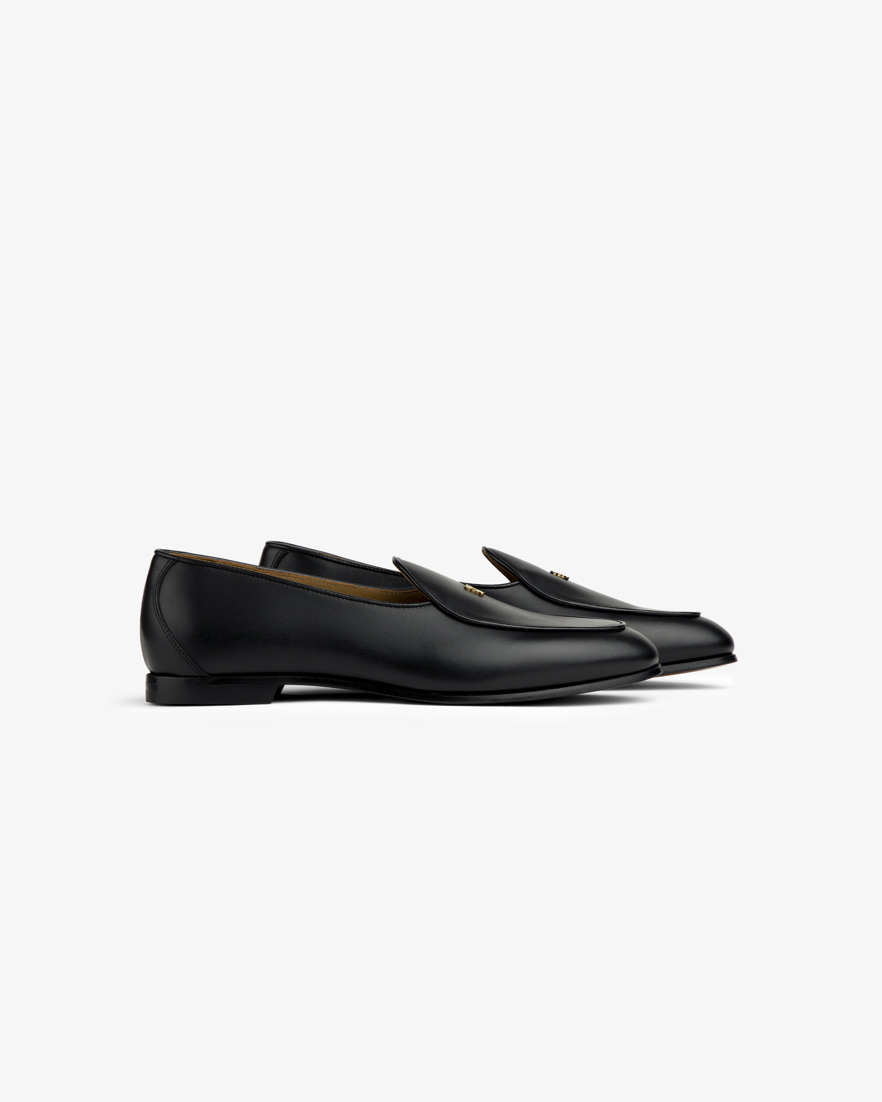Crest Salóni Loafer: black leather low-heel loafers displayed side by side on a plain white background.