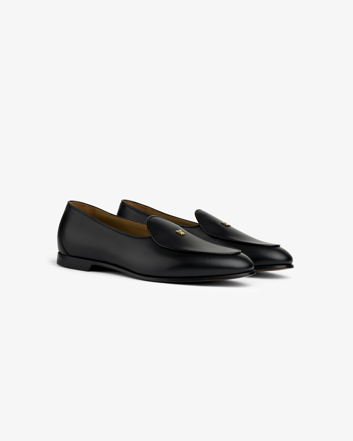Crest Salóni Loafer in black leather with gold bee detail, displayed at an angle on a white background.