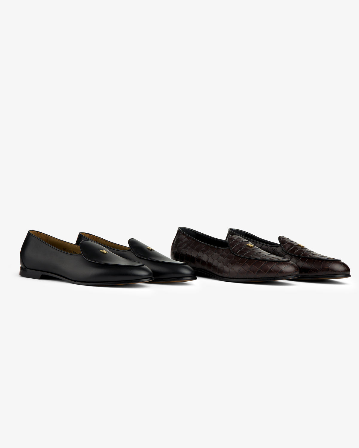 Two pairs of Croc-Embossed Crest Salóni Loafers: one black with gold detail, one dark brown quilted, on white.