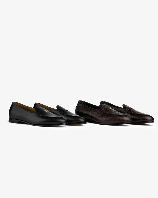 Two Crest Salóni loafers—one black, one dark brown quilted—shown on a white background.