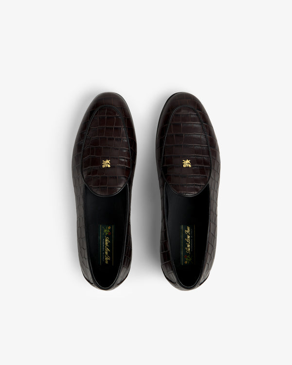 Top view of Croc-Embossed Crest Salóni Loafers in dark brown with gold emblems on the insoles.