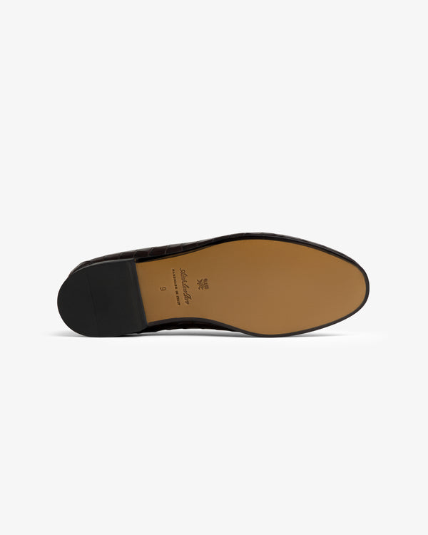 Croc-Embossed Crest Salóni Loafer with smooth tan sole, black heel, and brand text on the bottom.