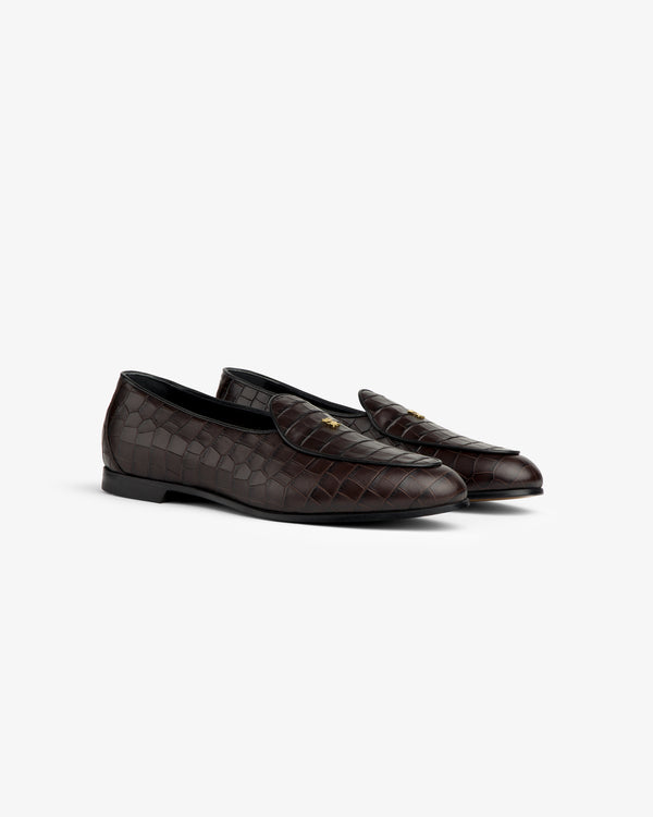 Croc-Embossed Crest Salóni Loafer in dark brown leather with gold emblem, shown on a plain white background.