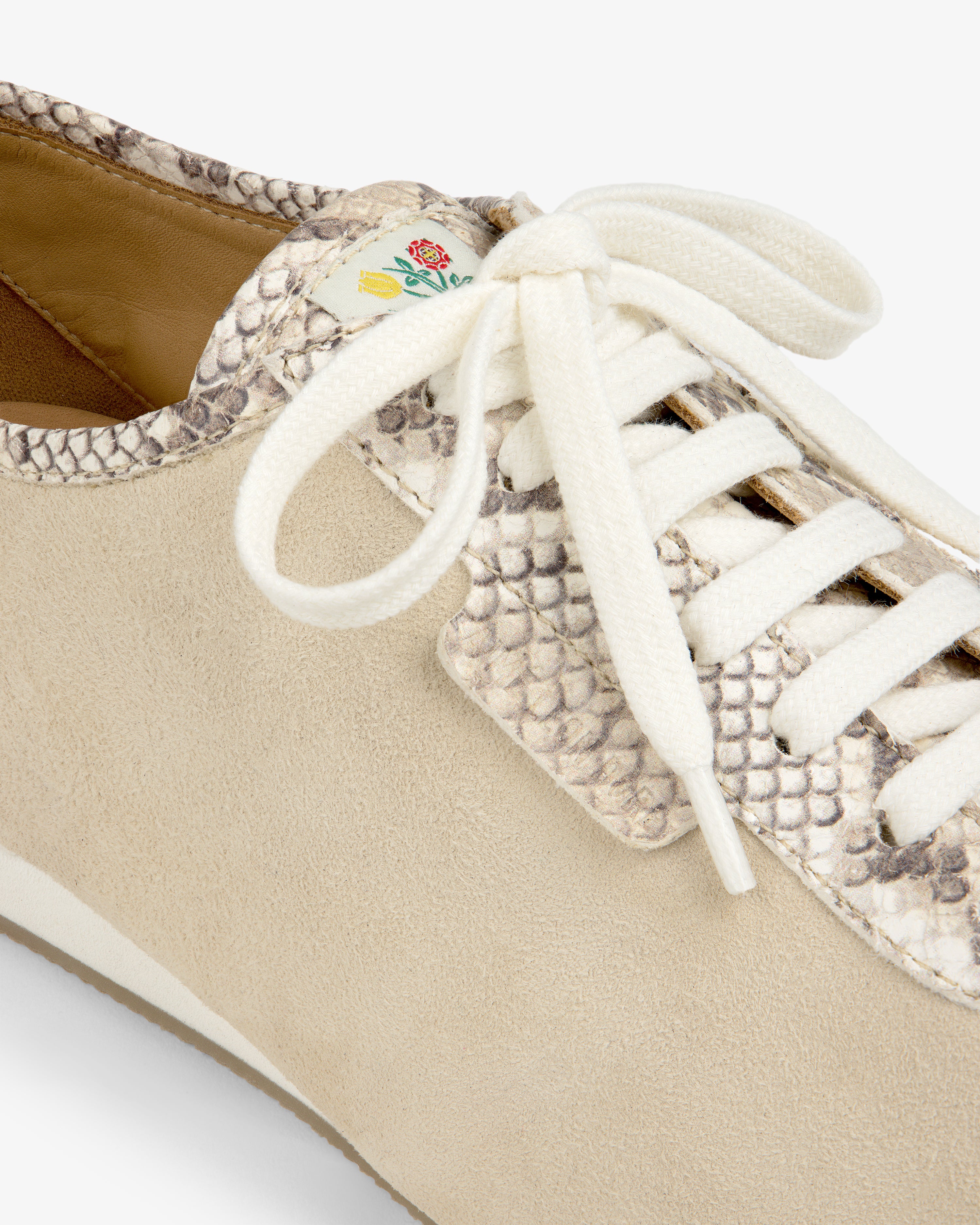Snake Print Low Profile Suede Trainer in beige suede with snake print accents and white laces.