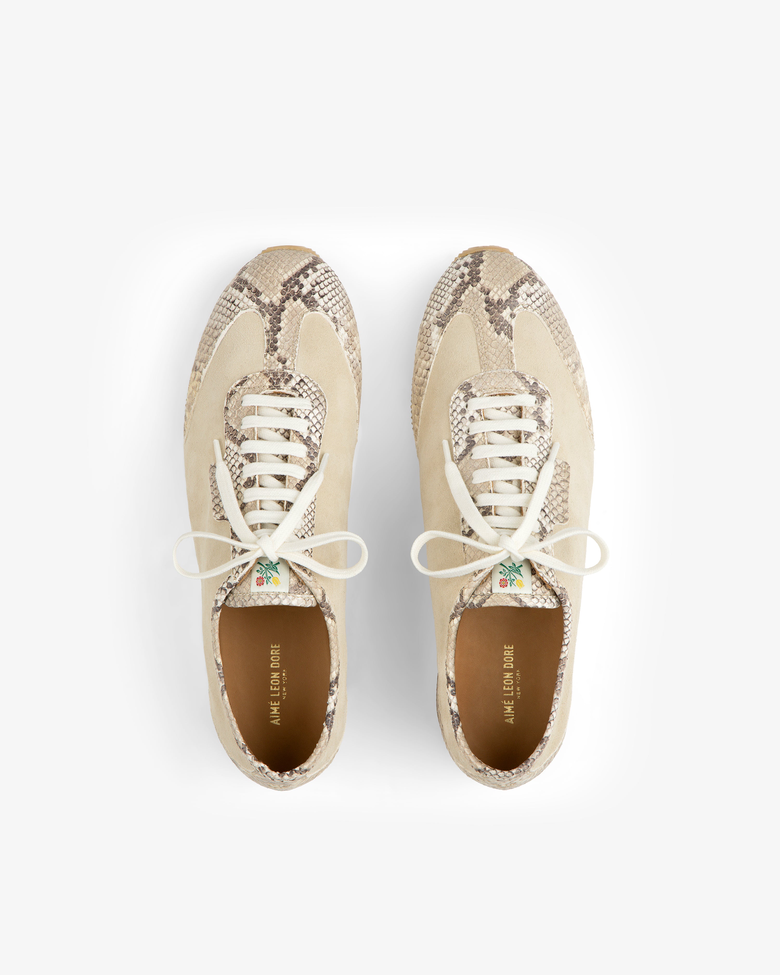 Snake Print Low Profile Suede Trainer in beige suede with snakeskin-patterned panels and white laces.