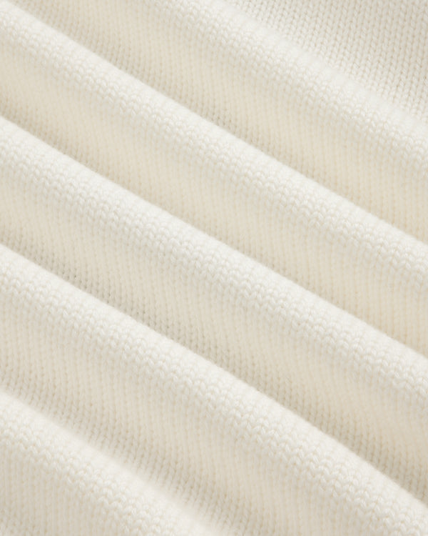 Close-up of Regatta Embroidered Crewneck Sweater’s soft, ribbed white knit with visible textured pattern.
