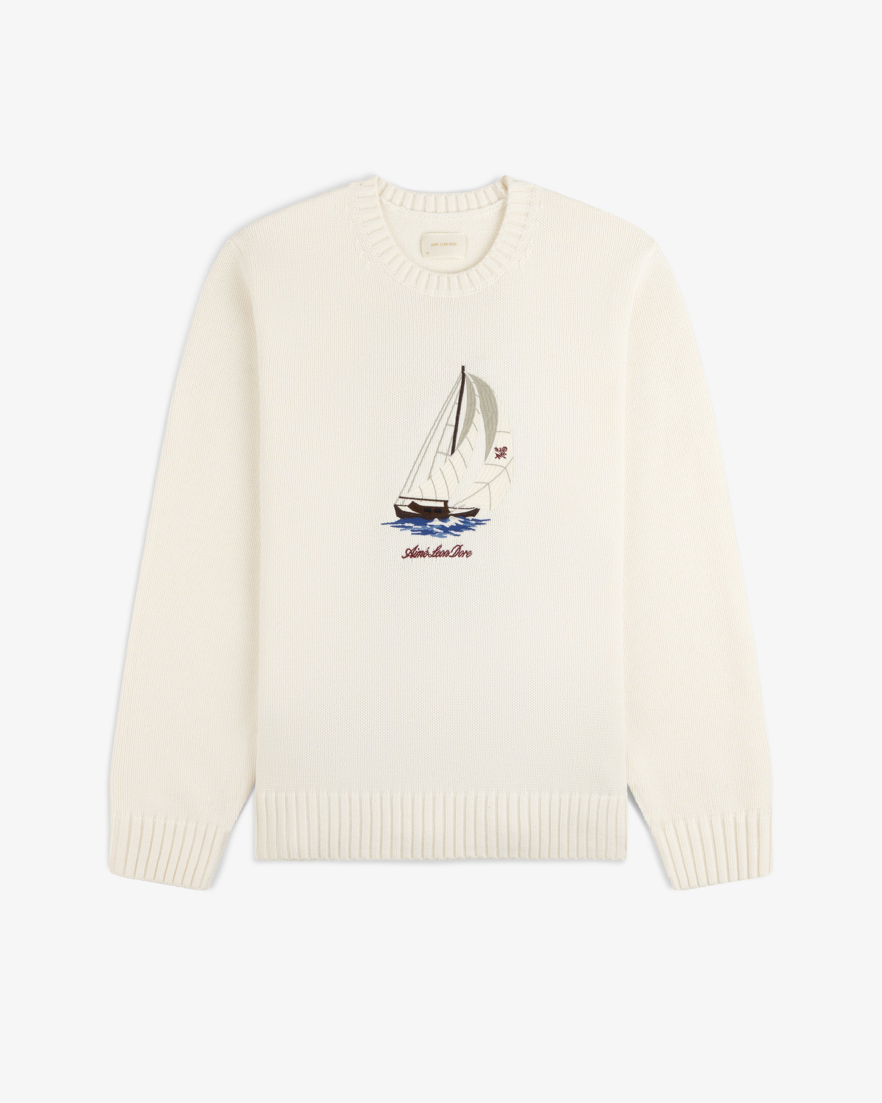 Regatta Embroidered Crewneck Sweater with sailboat and Saint-Malo Dior on front, shown on a white background.