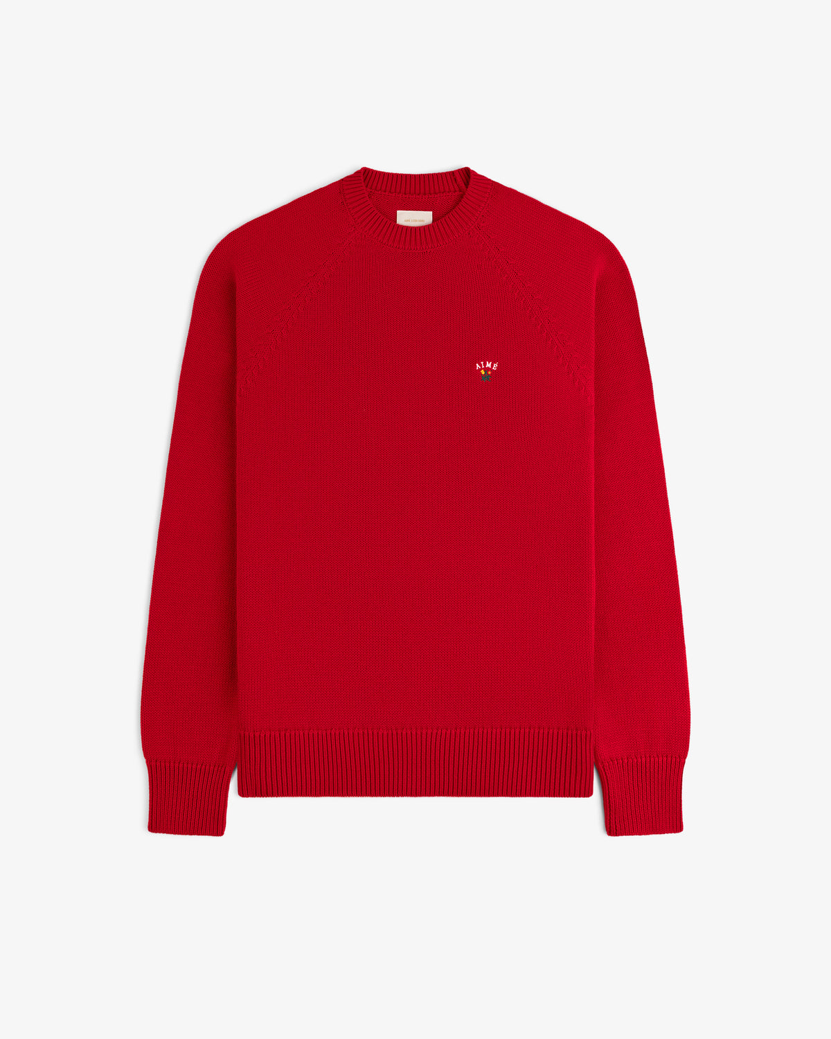 Crest Raglan Sweater: Bright red, long-sleeve knit with ribbed cuffs, hem, and a small left-chest logo.