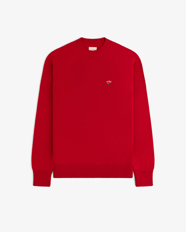 Crest Raglan Sweater: Bright red, long-sleeve knit with ribbed cuffs, hem, and a small left-chest logo.