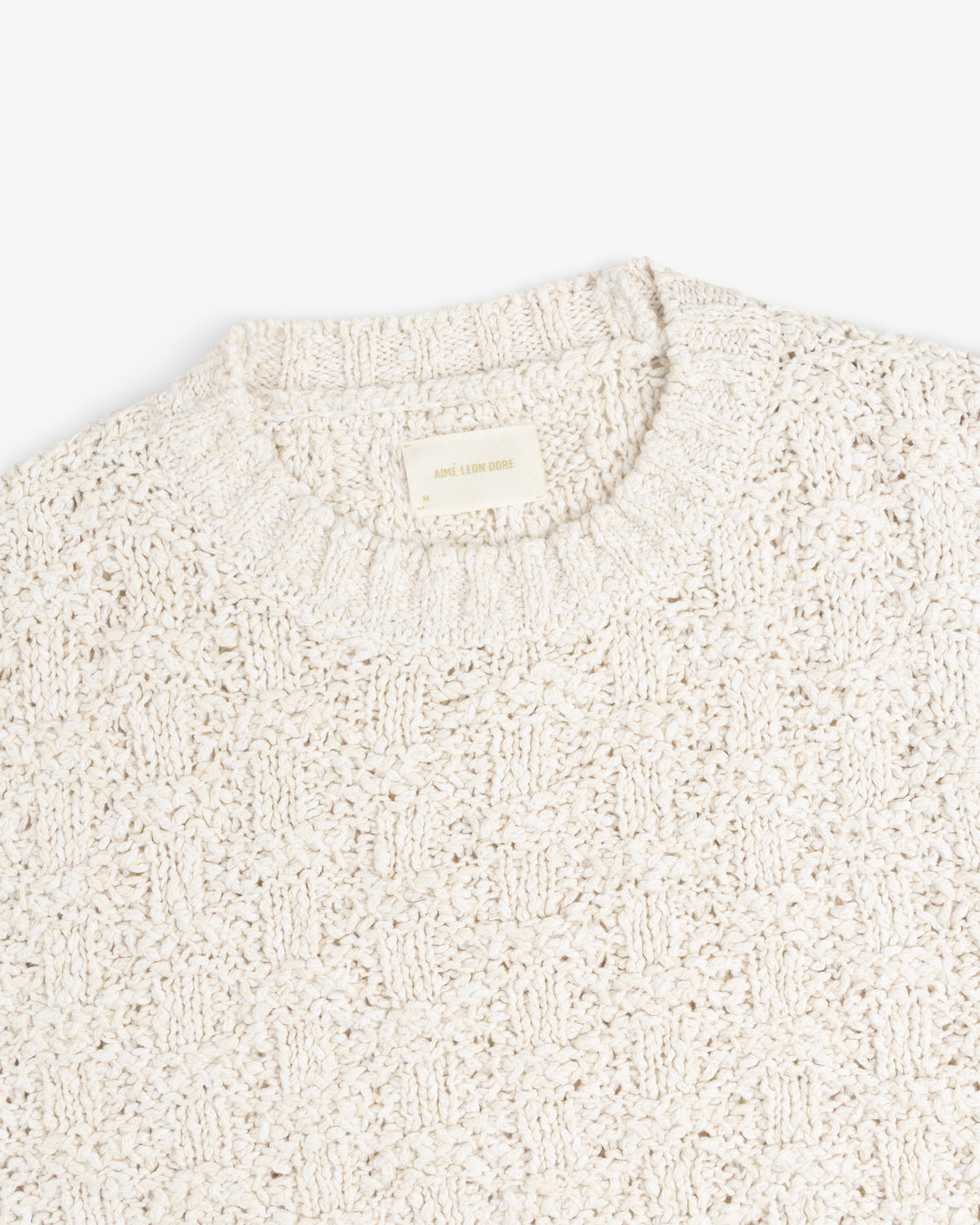 Off-white Checkerboard Bouclé Sweater with a textured checkerboard knit pattern.