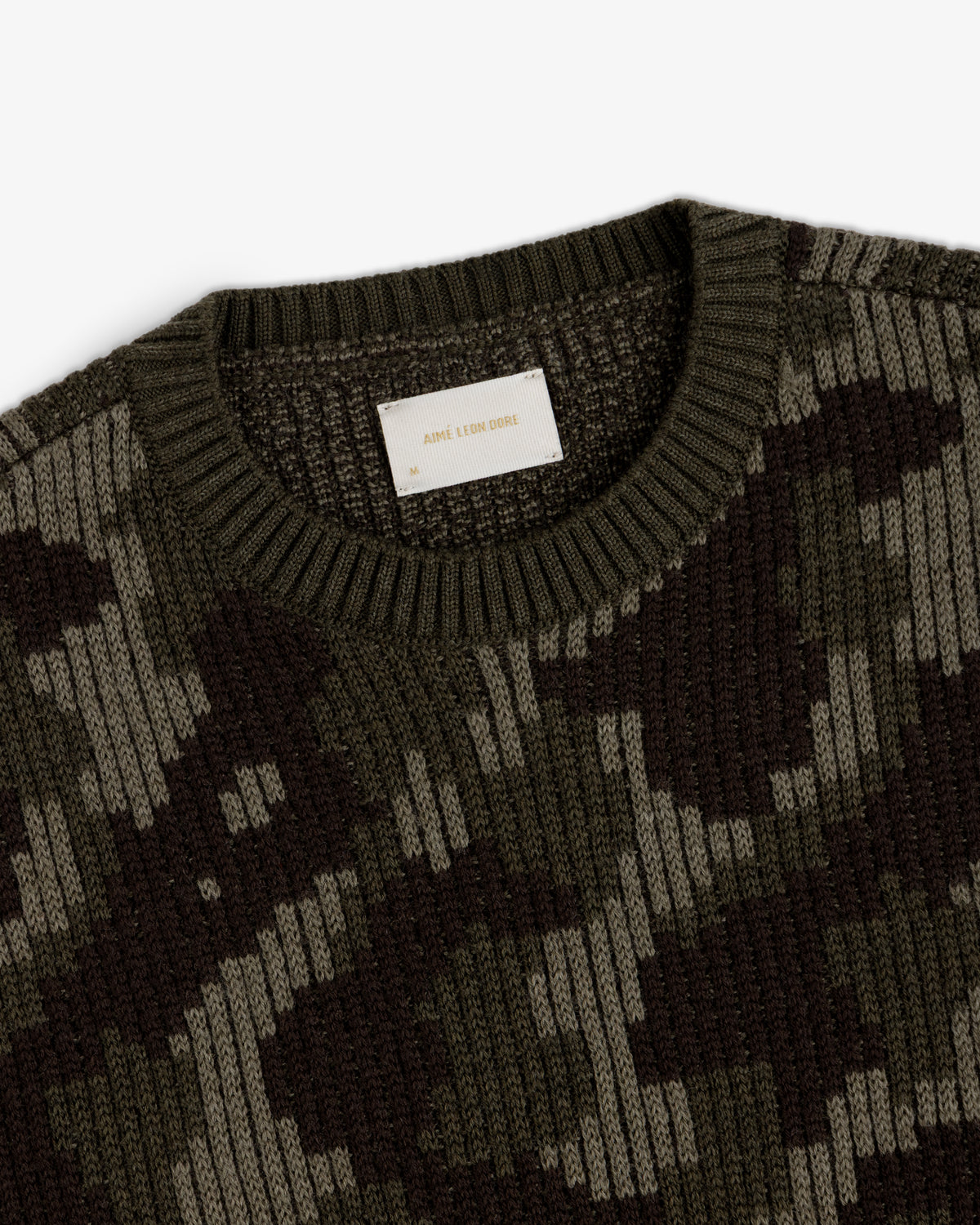 Wool Jacquard Camo Sweater in olive and dark brown with a ribbed crew neckline.