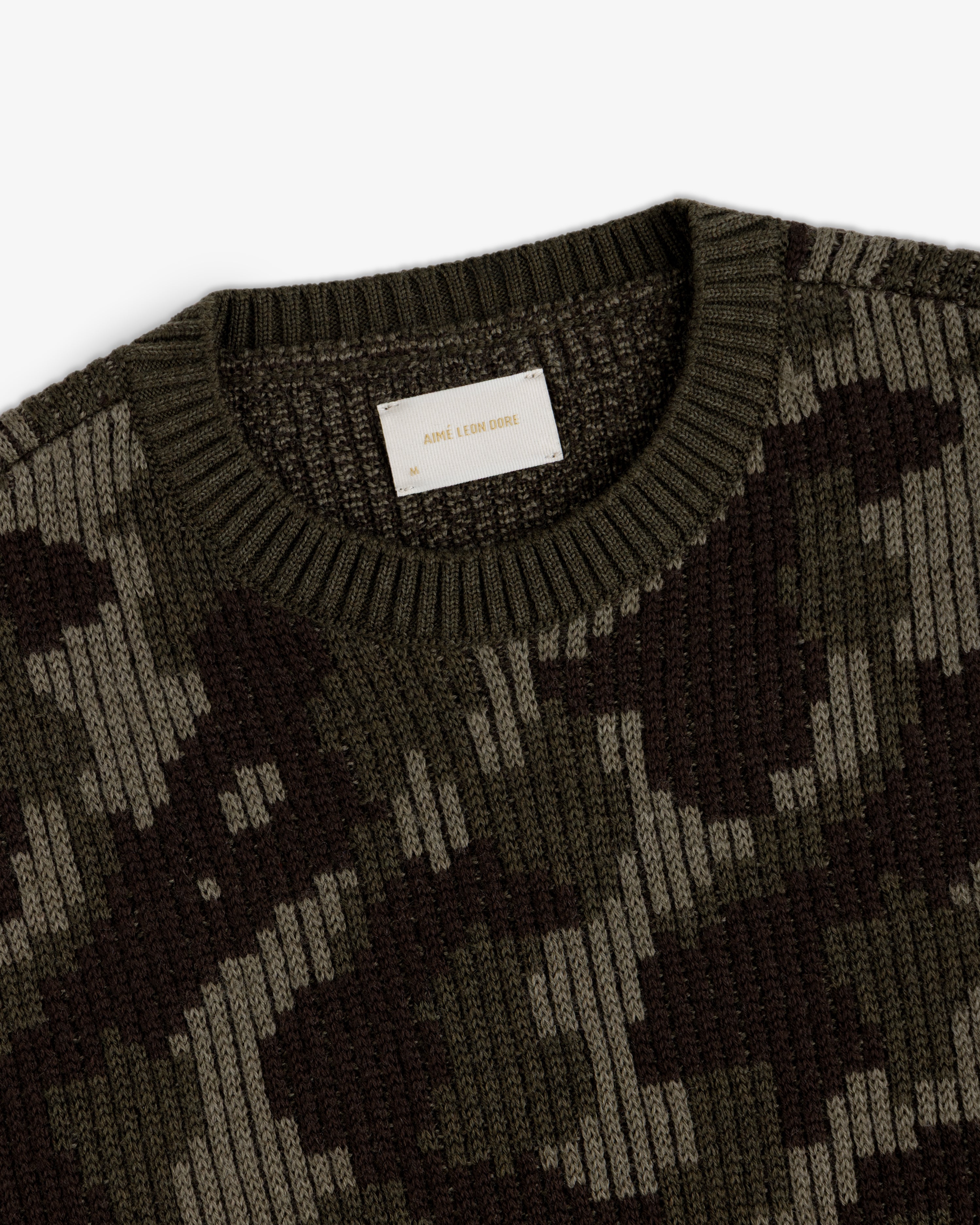 Wool Jacquard Camo Sweater in olive and dark brown with a ribbed crew neckline.