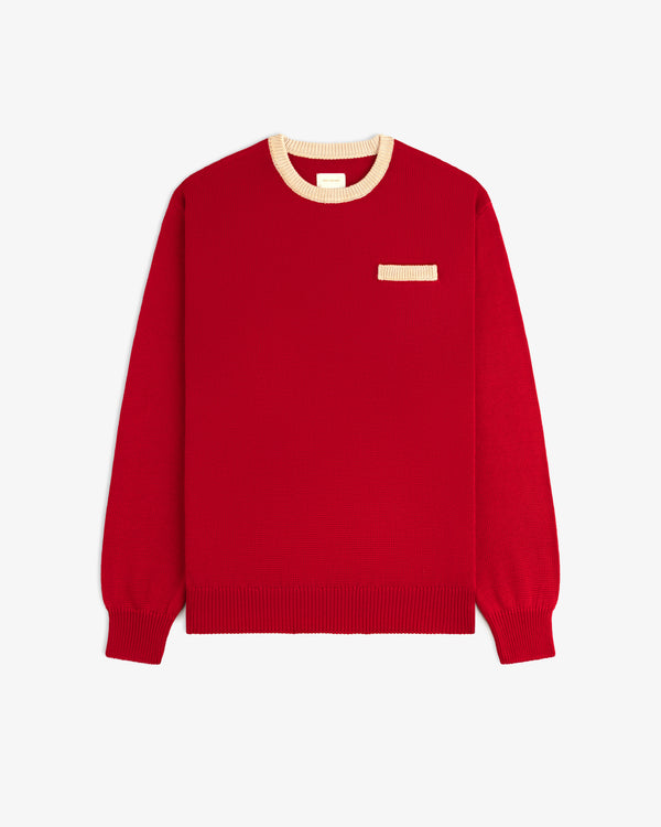 Knit Pocket Crewneck Sweater in red with a contrasting cream ribbed collar and small chest pocket.