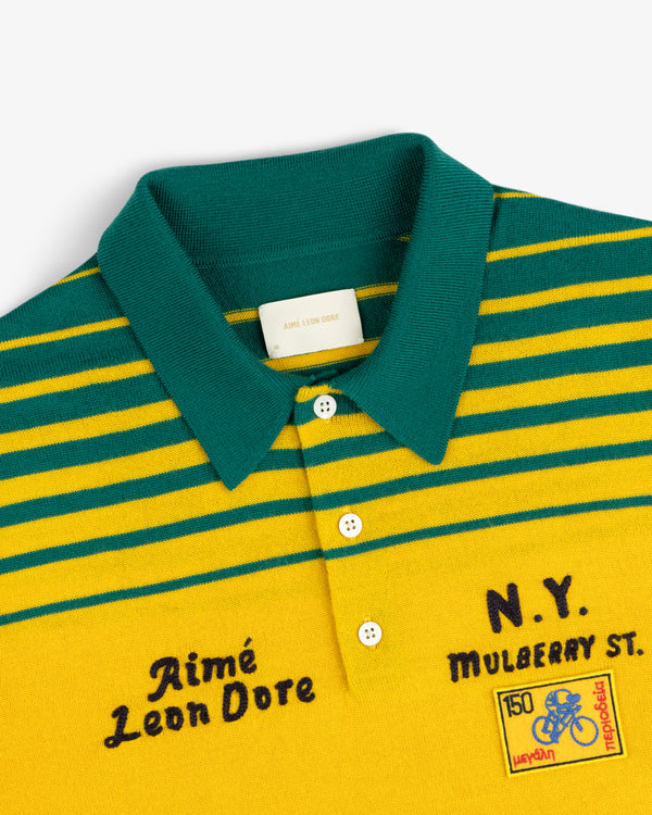 Merino Wool Knit Cycling Polo in yellow/green stripes with Aimé Leon Dore and N.Y. Mulberry St. embroidered front.