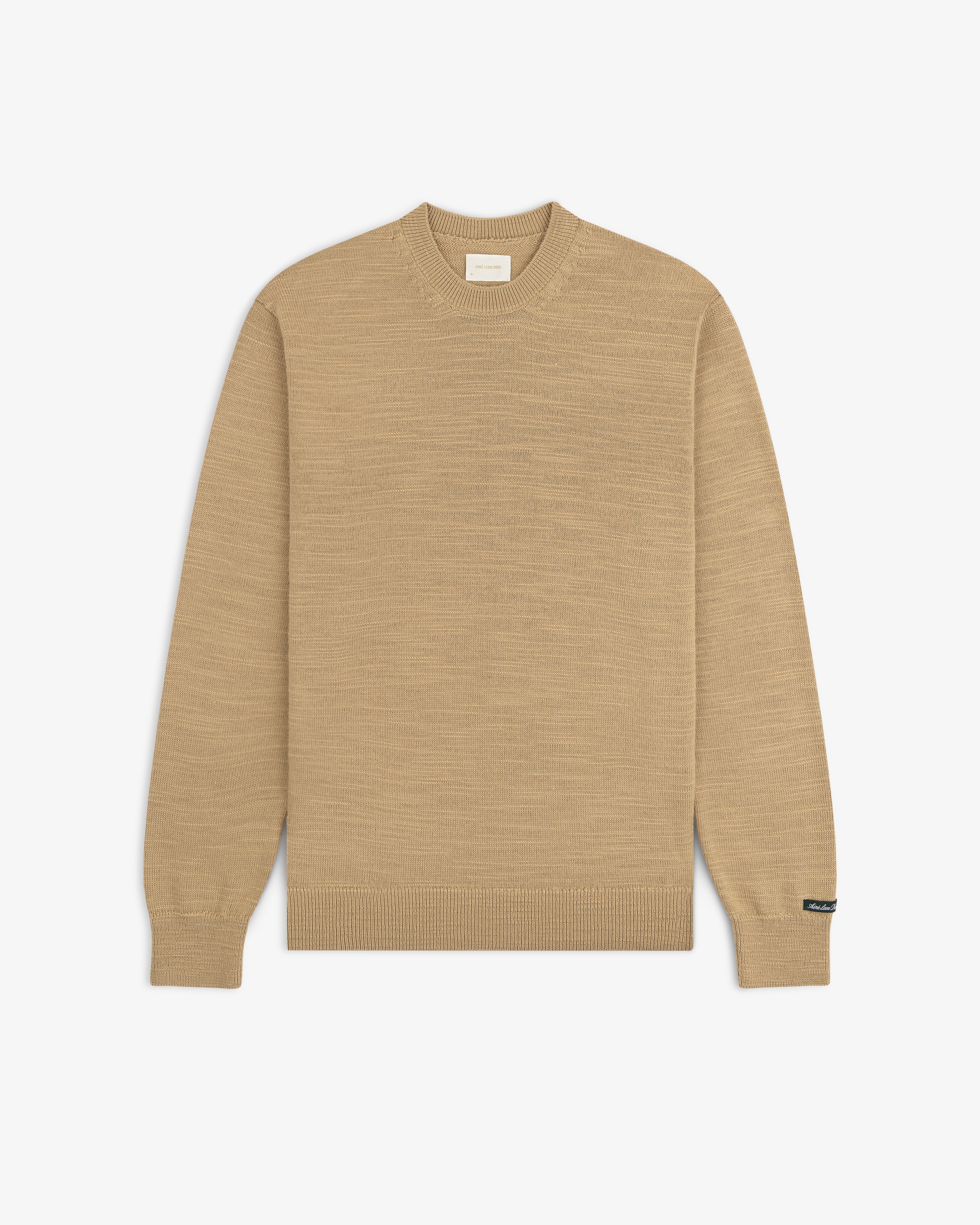 Slub Merino Wool Sweater in a tan crew-neck, long-sleeve textured knit.