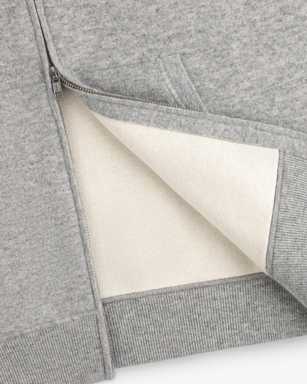 Full-Zip Pavilion Cashmere Hoodie in gray, partially unzipped to show cream lining and ribbed hem.