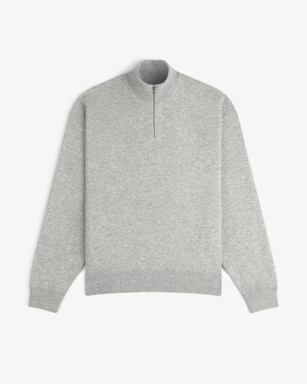 Quarter Zip Pavilion Cashmere Pullover in light gray with long sleeves and mock neck, laid flat on white background.
