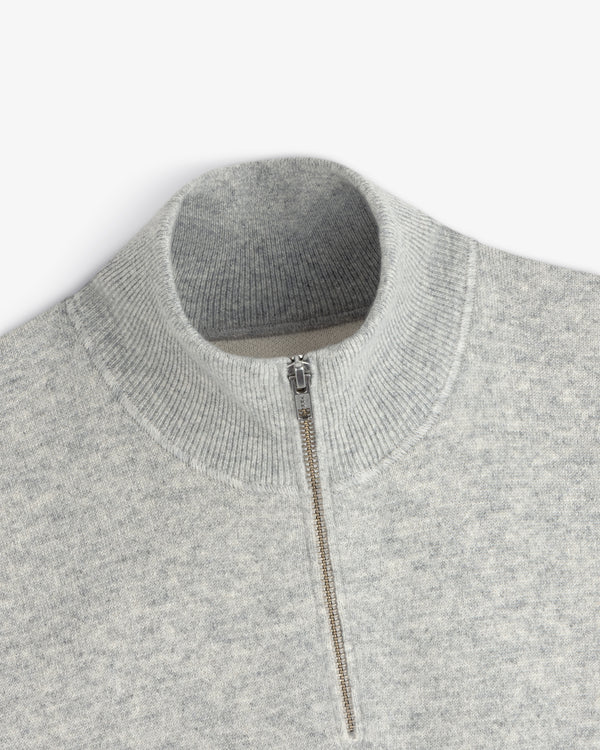 Quarter Zip Pavilion Cashmere Pullover in light gray with ribbed mock neck, shown from a top view.