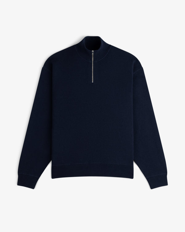 Quarter Zip Pavilion Cashmere Pullover in navy blue with long sleeves and mock neck, shown flat on a white background.