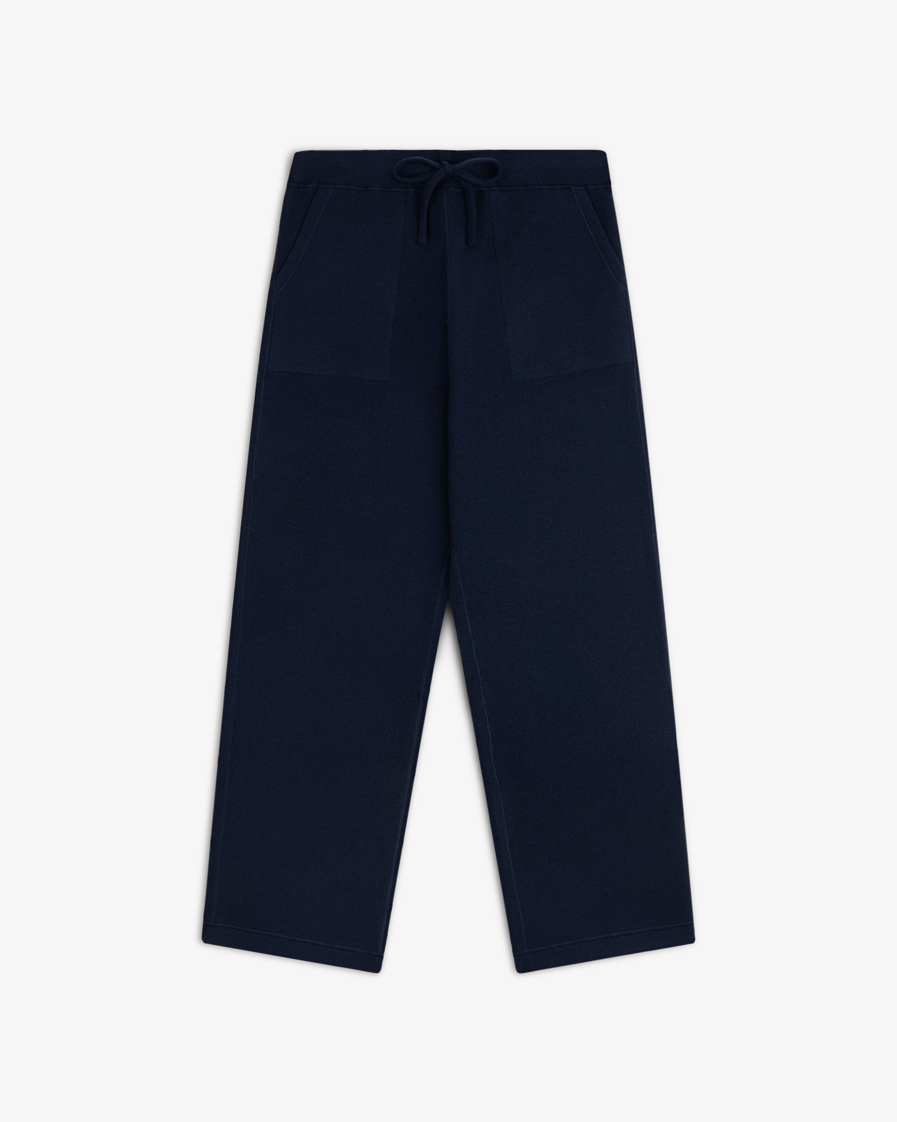 Pavilion Cashmere Sweatpant in navy with wide legs, front patch pockets, and drawstring waist on white background.