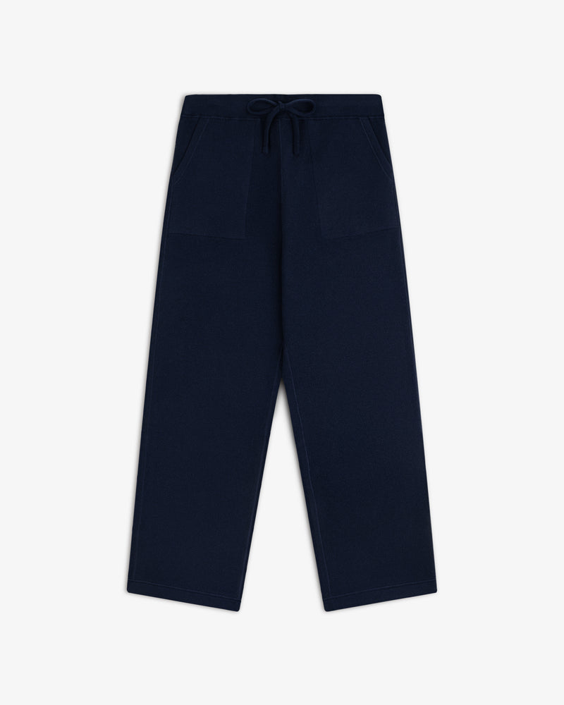 Pavilion Cashmere Sweatpant in navy with wide legs, front patch pockets, and drawstring waist on white background.