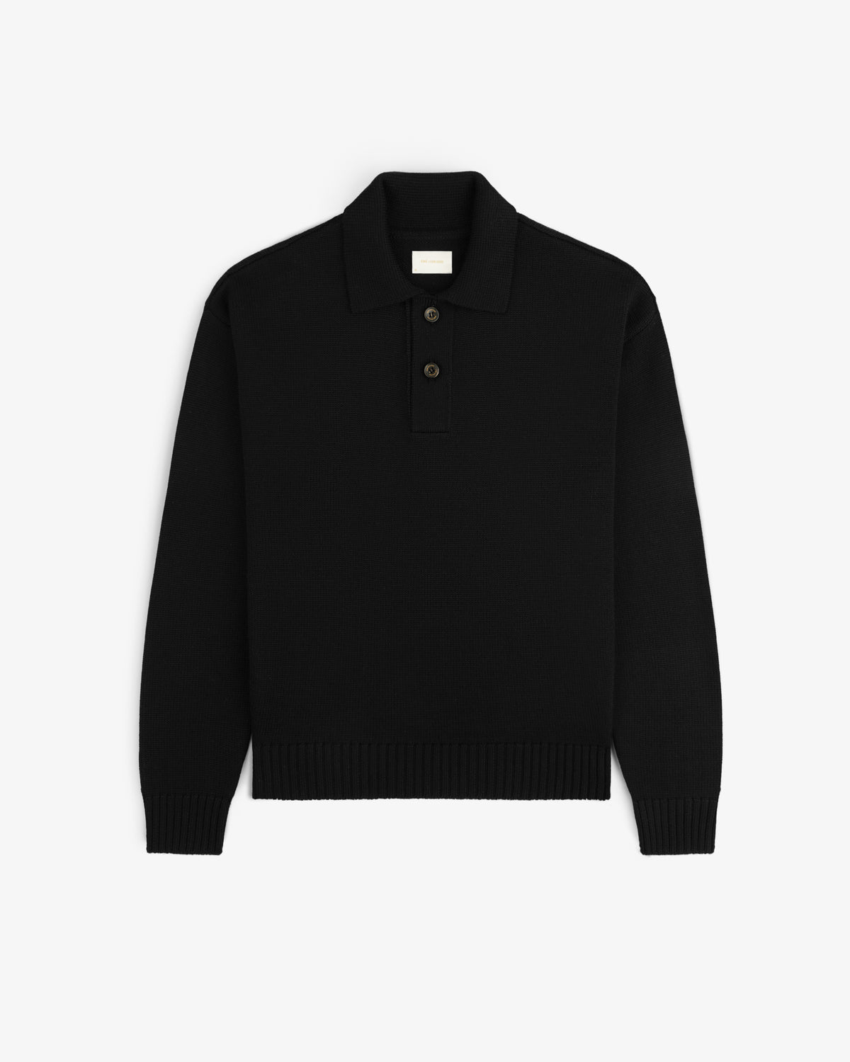 Black Long-Sleeve Merino Polo featuring a three-button placket and ribbed cuffs and hem.