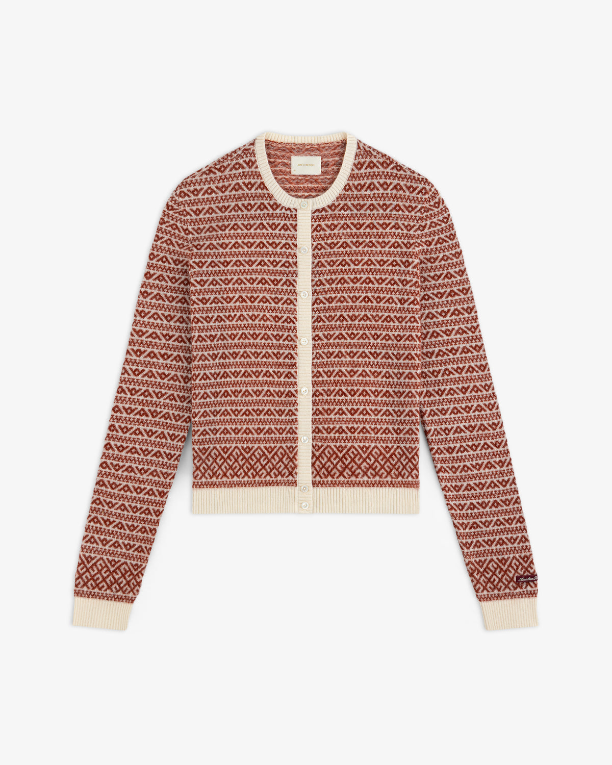 Wool Cashmere Jacquard Cardigan in a rust and cream geometric pattern with a button-front closure and ribbed trim.