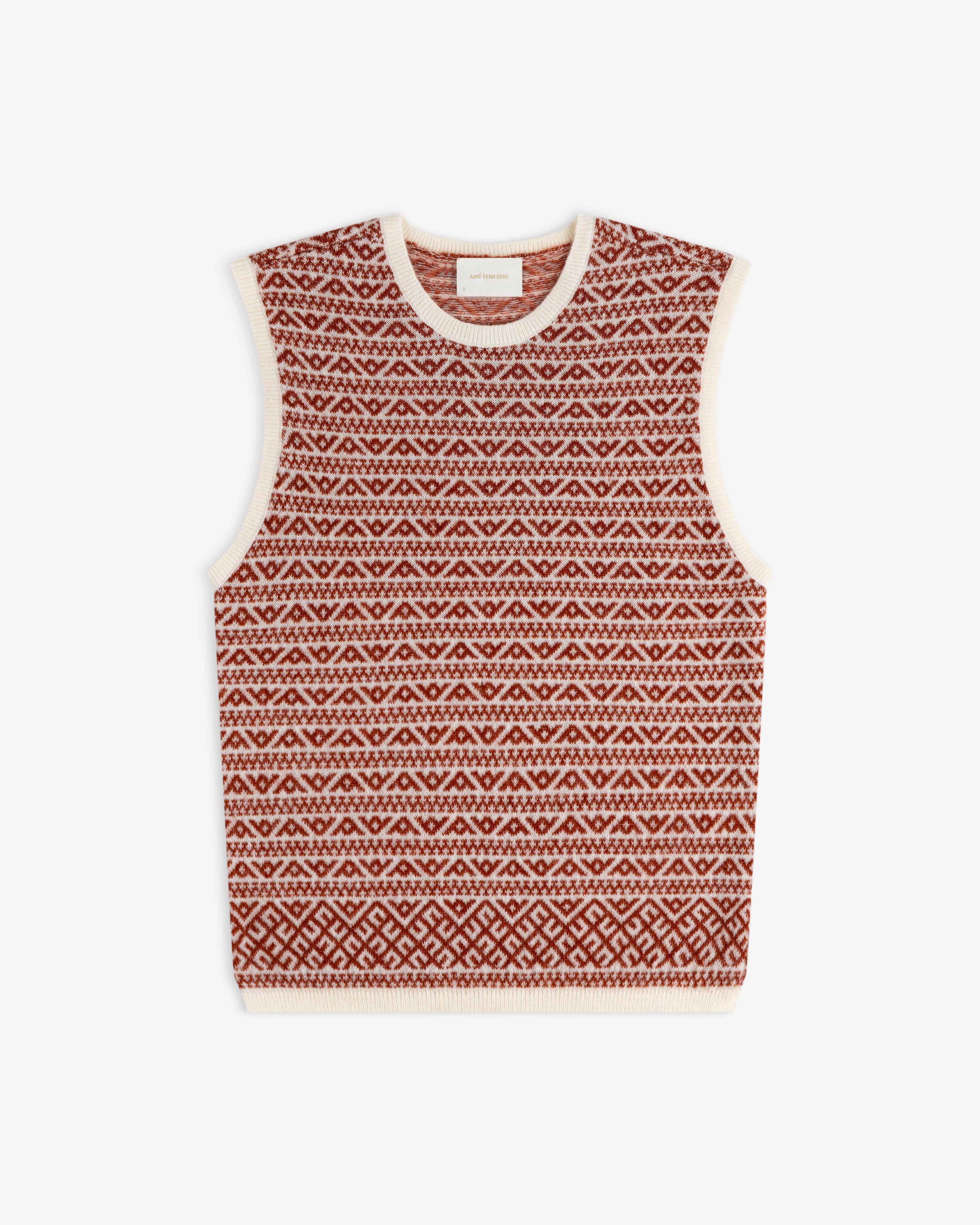 Wool Cashmere Jacquard Shell sleeveless knit sweater vest in a rust and cream geometric pattern with cream trim.