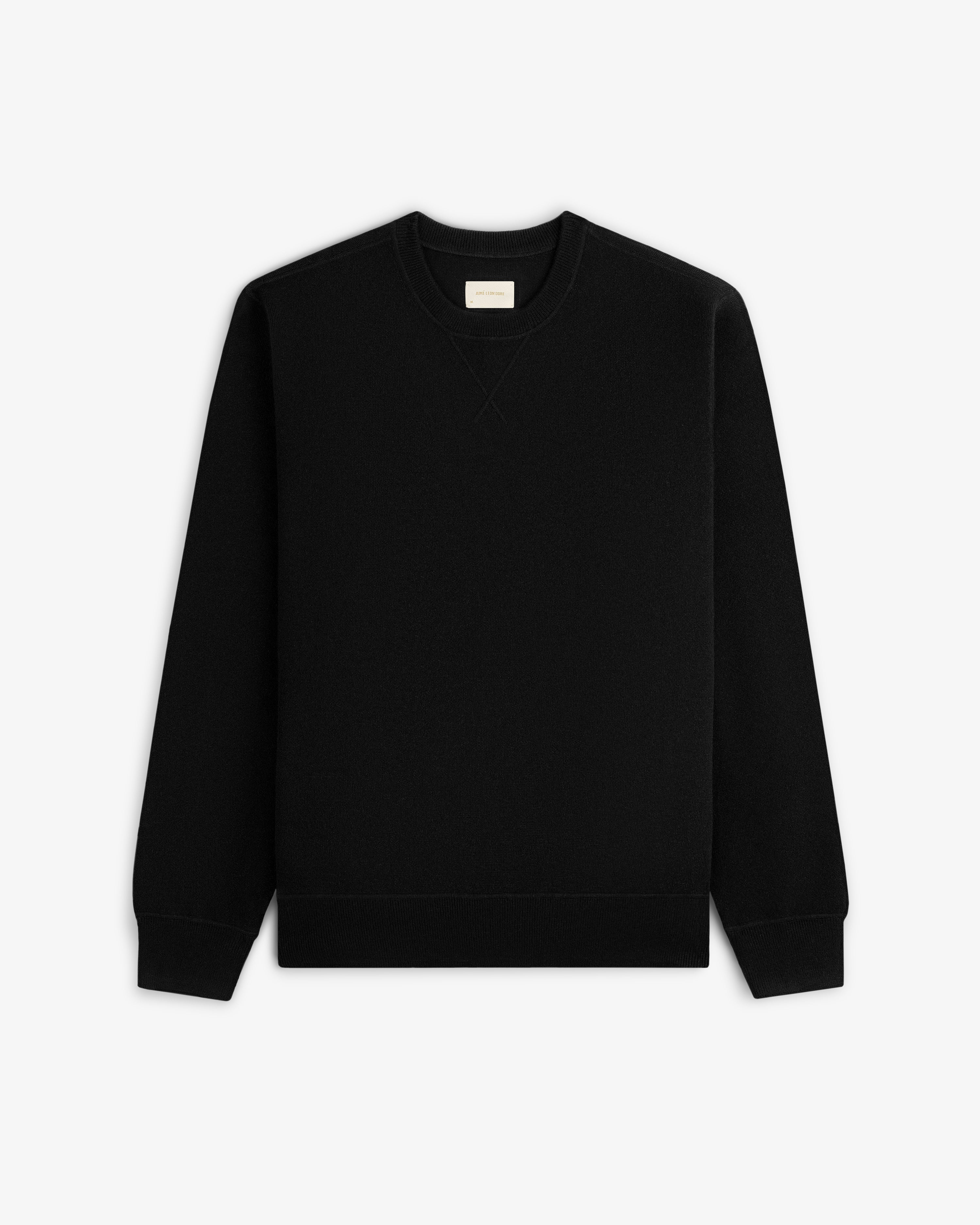 Pavilion Cashmere Crewneck Sweatshirt in black, long sleeves, displayed flat on a white background.