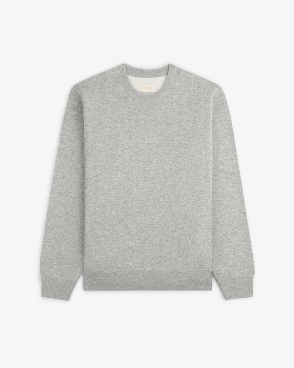 Pavilion Cashmere Crewneck Sweatshirt in light gray, laid flat on white with ribbed cuffs and waistband.