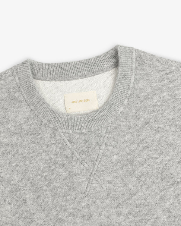 Pavilion Cashmere Crewneck Sweatshirt with ribbed collar, AIMÉ LEON DORE label, shown on a white background.