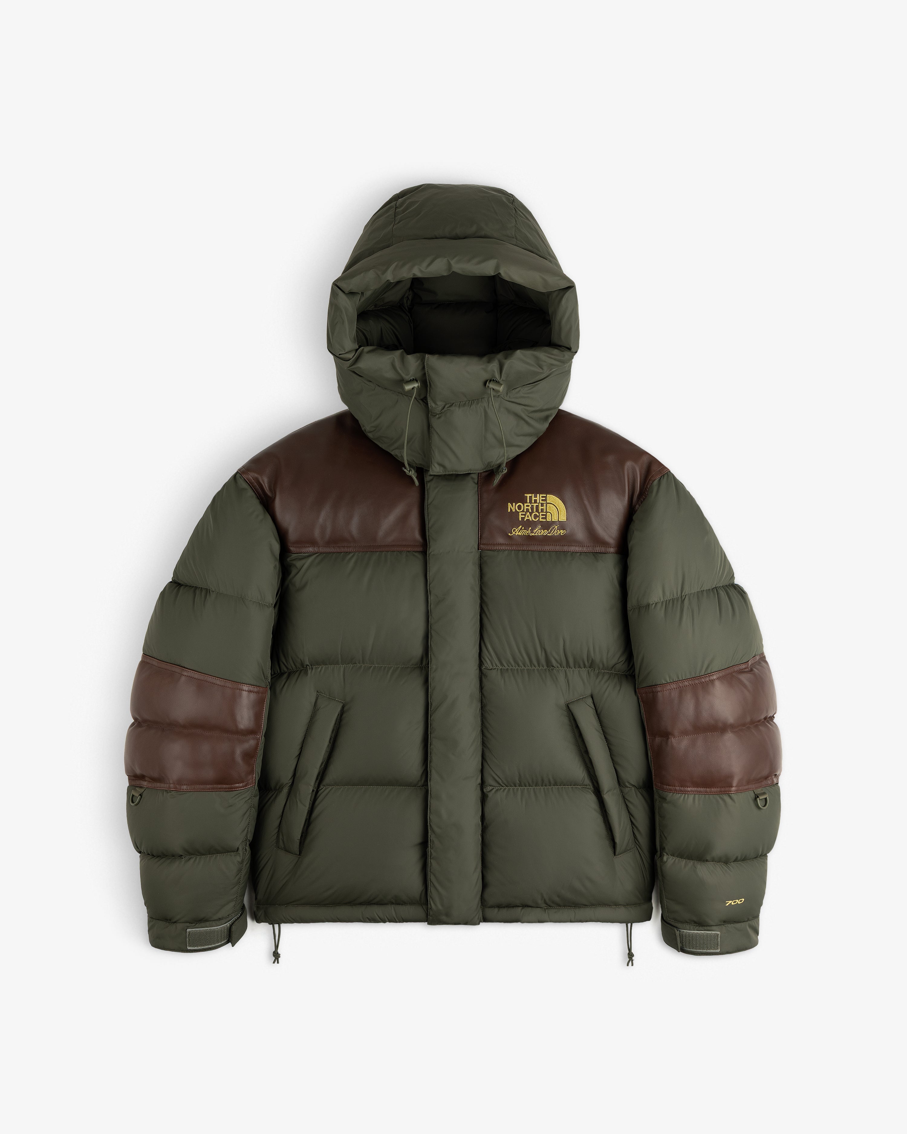 ALD / The North Face Baltoro Jacket: Olive green puffer, brown shoulders, hood, chest logo.