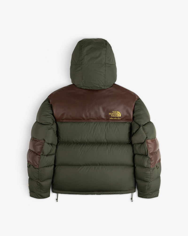 ALD / The North Face Baltoro Jacket in olive green/brown with hood, back view, featuring The North Face logo.